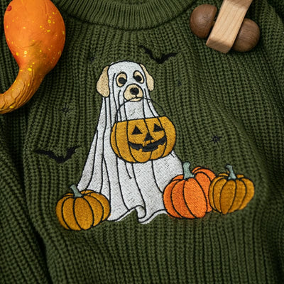 Green sweater with a dog in a ghost costume and pumpkins embroidered on it.