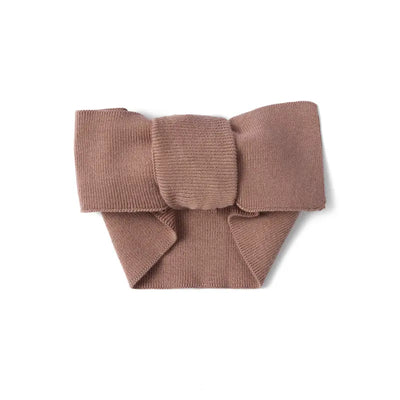 Brown knitted bow on a white background